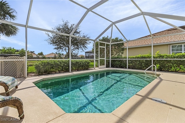 pool featuring a patio area and a lanai