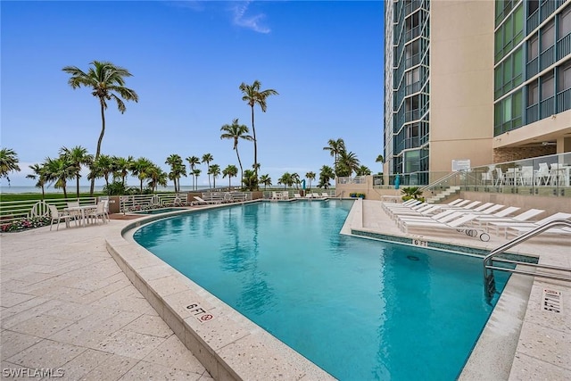 view of pool featuring a patio area