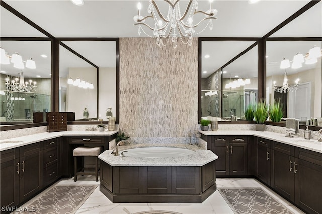 bathroom with vanity, a notable chandelier, and plus walk in shower