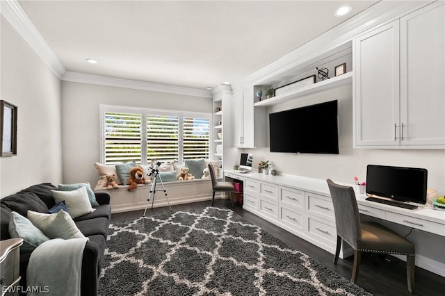 office space featuring ornamental molding, dark hardwood / wood-style flooring, and built in desk