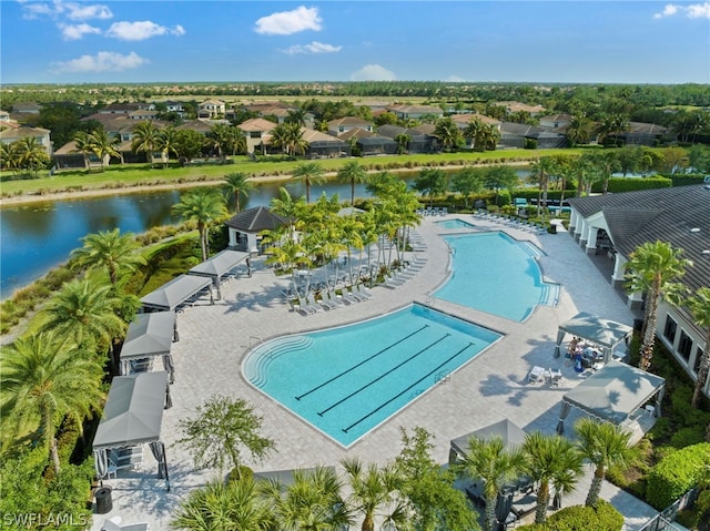 view of pool with a water view