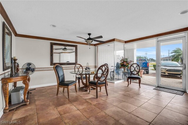 dining area with tile patterned floors, ceiling fan, and ornamental molding