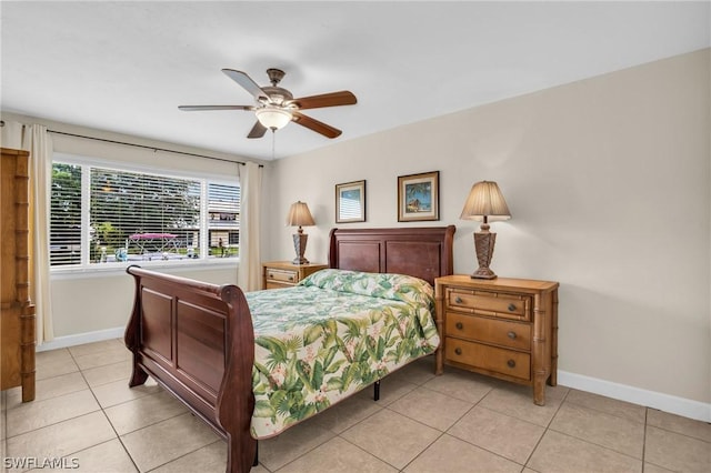 bedroom featuring ceiling fan and light tile patterned flooring