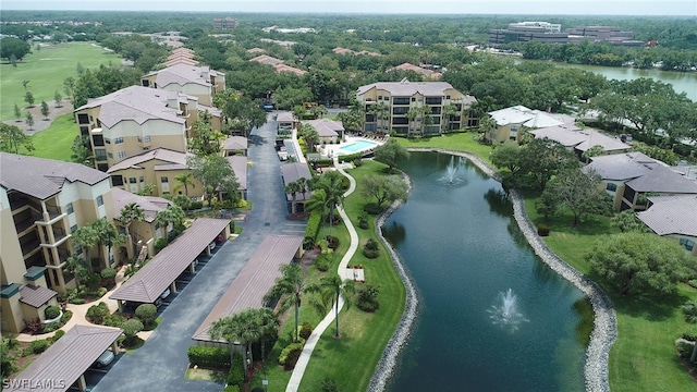 bird's eye view with a water view