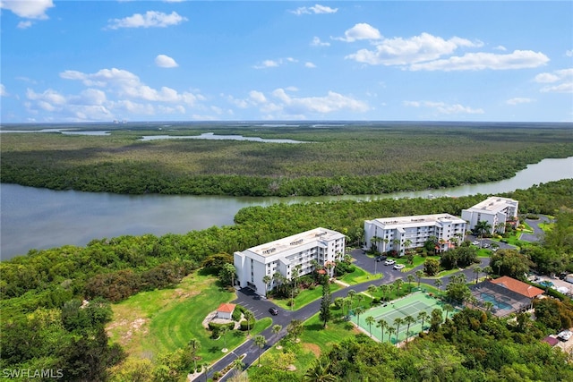 drone / aerial view with a water view