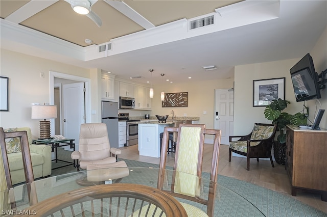 interior space featuring ceiling fan and light wood-type flooring