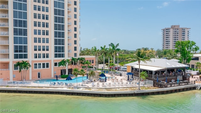 view of swimming pool with a water view