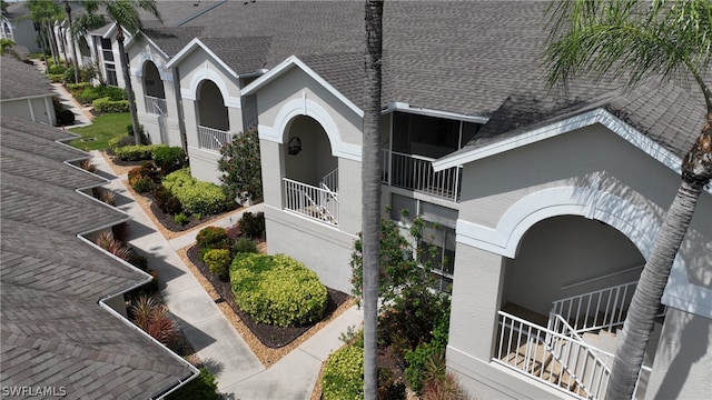 view of front of home with a balcony