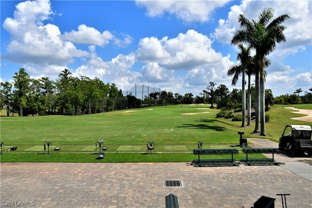 view of property's community featuring a yard