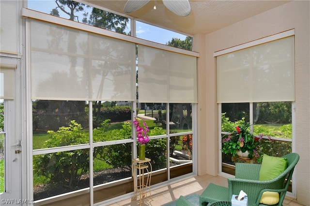 sunroom / solarium with ceiling fan