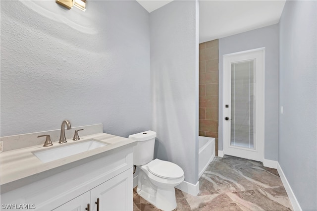 full bathroom featuring tile floors, tiled shower / bath, toilet, and vanity