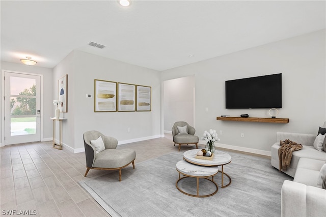 living room featuring light wood-type flooring