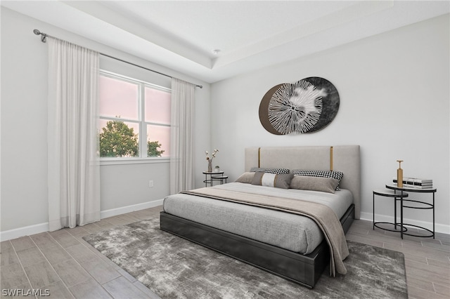 bedroom with light hardwood / wood-style flooring