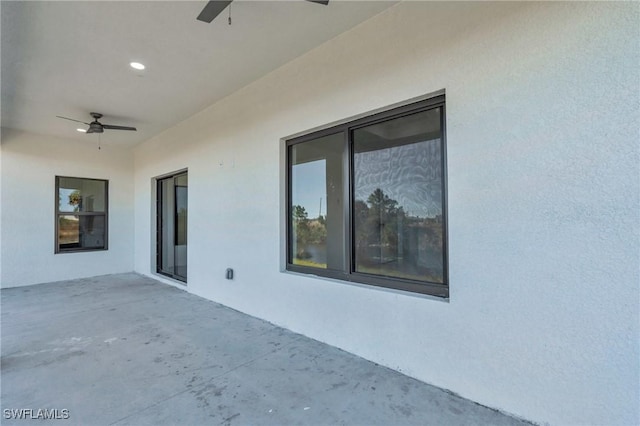 view of patio / terrace with ceiling fan