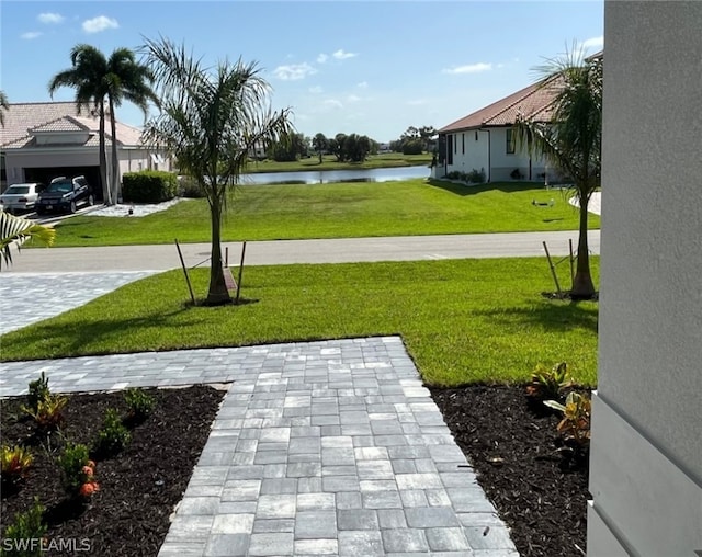 view of yard with a water view