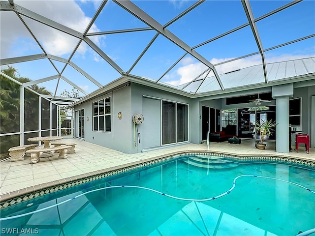 view of pool featuring a lanai and a patio area