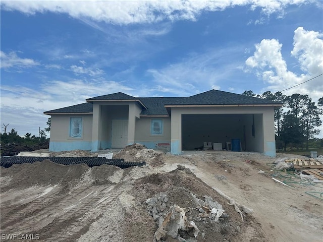 view of front of home with a garage