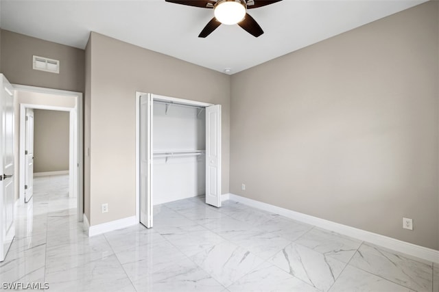 unfurnished bedroom featuring a closet and ceiling fan