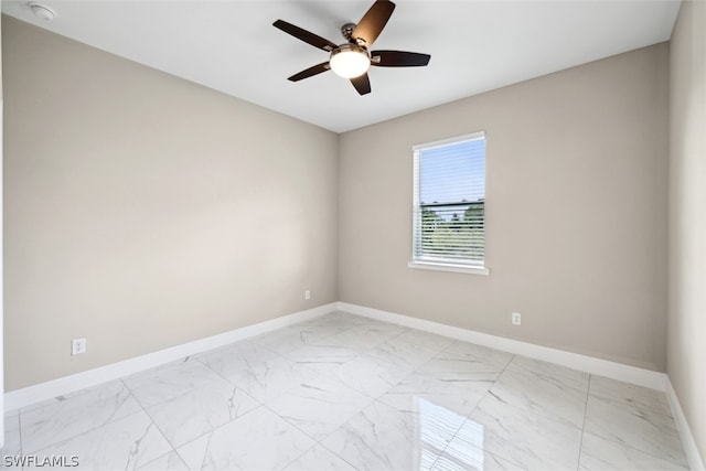 unfurnished room featuring ceiling fan