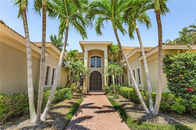 entrance to property featuring french doors