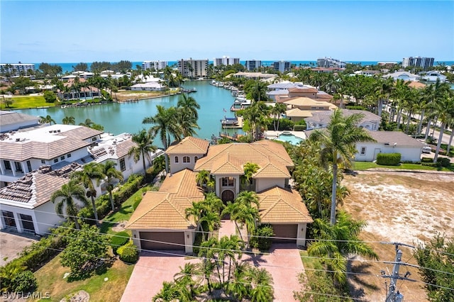 drone / aerial view with a water view