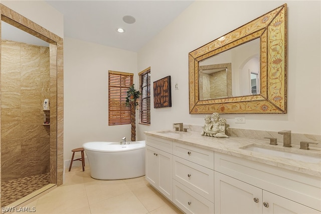 bathroom featuring dual vanity, independent shower and bath, and tile flooring