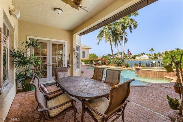 view of patio featuring french doors and ceiling fan