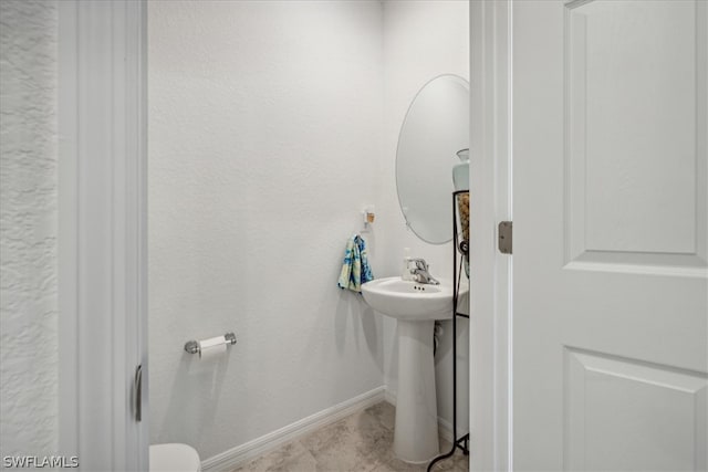 bathroom featuring tile flooring