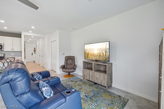 living room featuring light tile floors