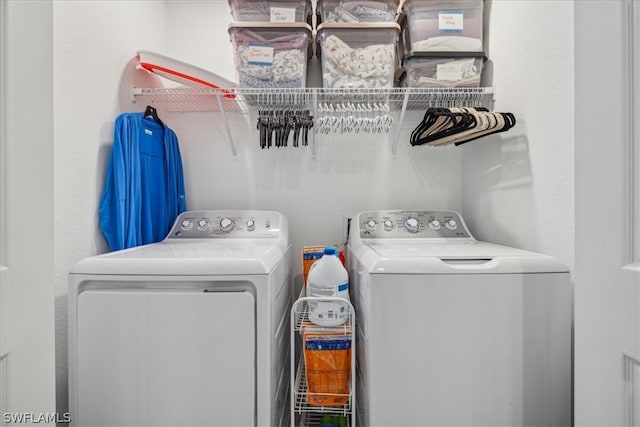 laundry room featuring washing machine and dryer