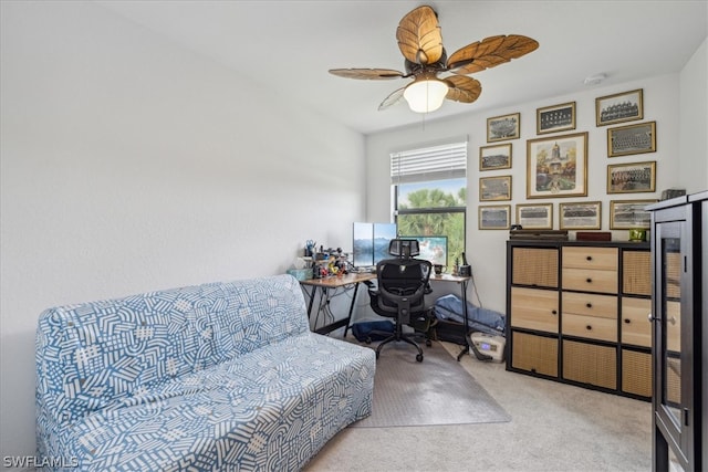 office space featuring ceiling fan and carpet floors