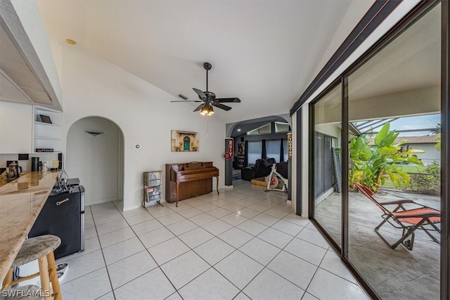 interior space with ceiling fan and light tile patterned floors