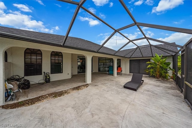 view of patio with a lanai