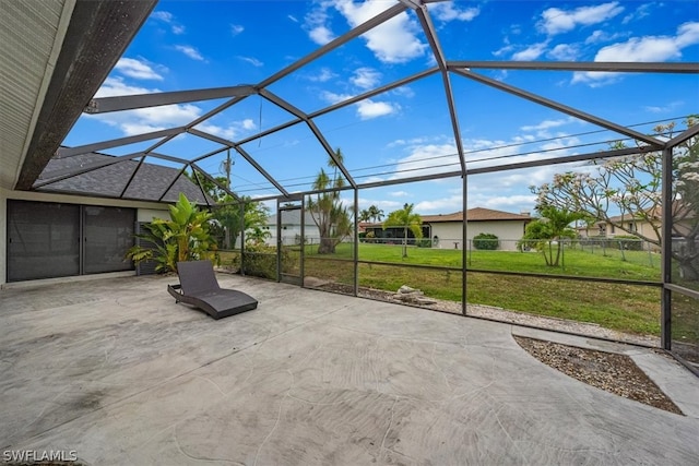 view of patio with a lanai