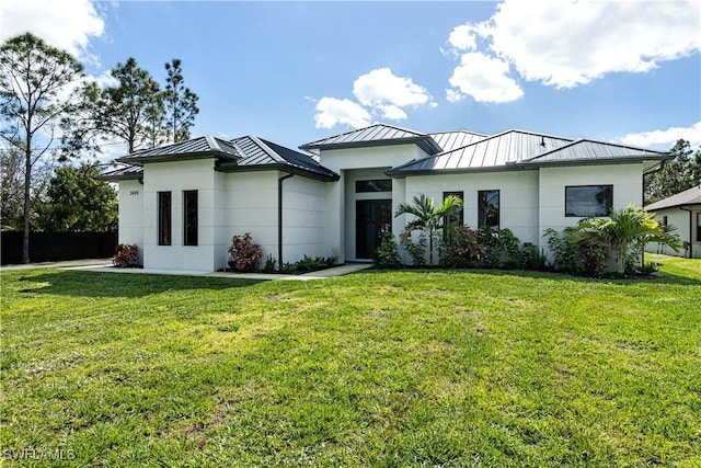 view of front facade with a front lawn