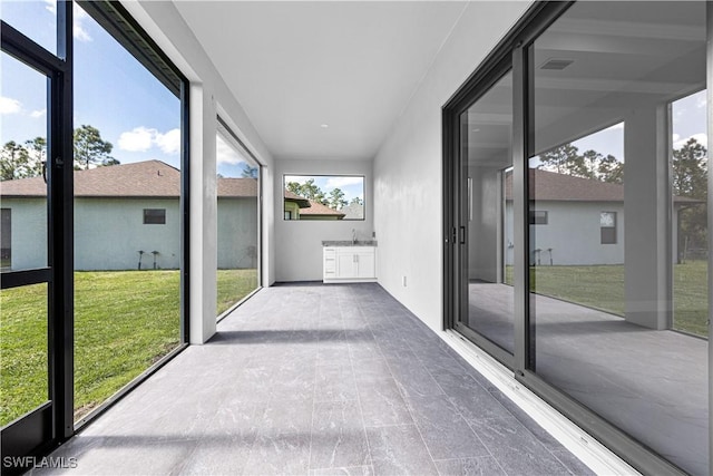 view of unfurnished sunroom