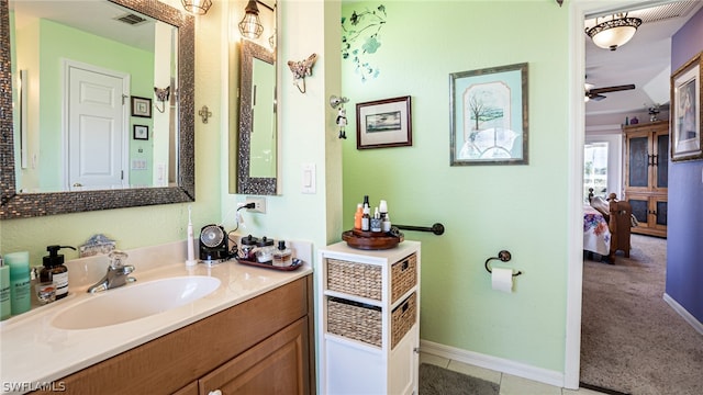 bathroom with vanity, tile patterned floors, and ceiling fan