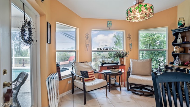 sitting room featuring light tile patterned flooring