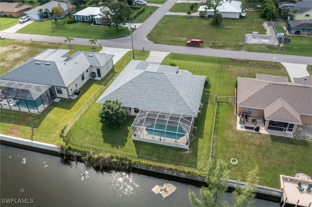 drone / aerial view with a water view