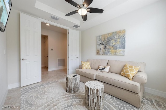 living room with ceiling fan