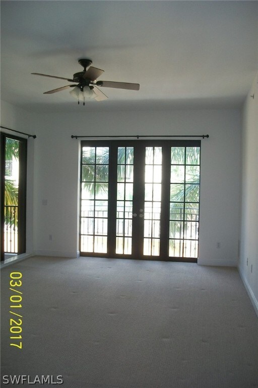 spare room featuring carpet and a healthy amount of sunlight