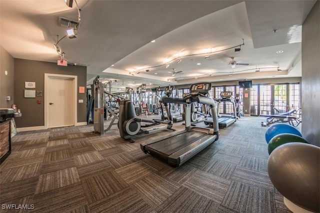 exercise room featuring carpet floors and ceiling fan