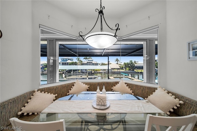 dining area with a water view