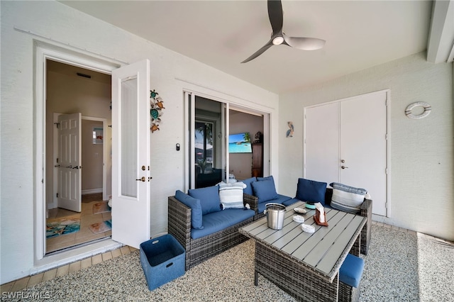 view of patio featuring ceiling fan and outdoor lounge area