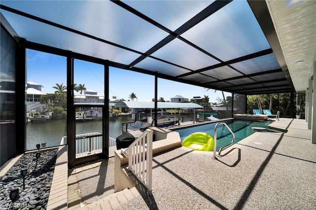 view of pool featuring a patio, a boat dock, a lanai, and a water view