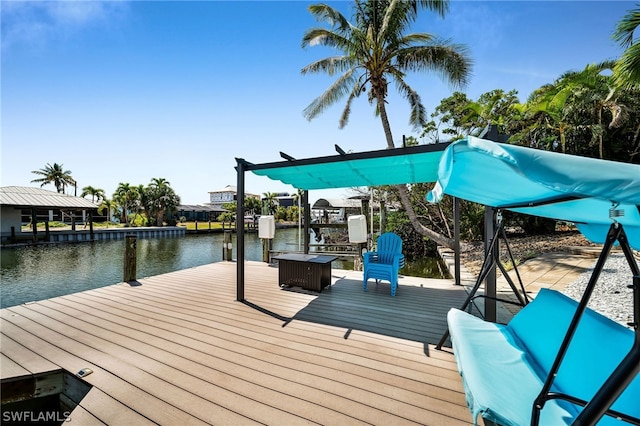 view of dock with a water view