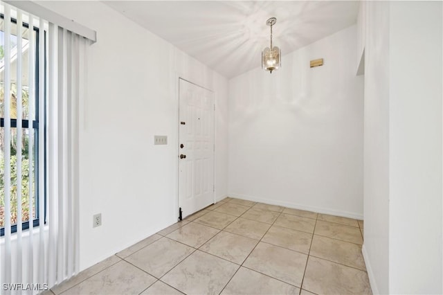 interior space featuring light tile patterned flooring