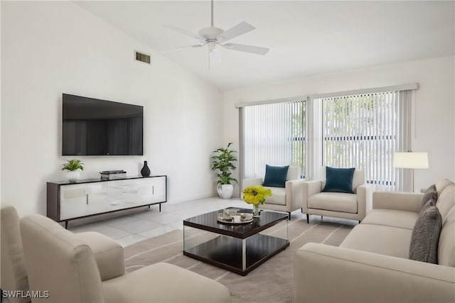 tiled living room with ceiling fan and high vaulted ceiling