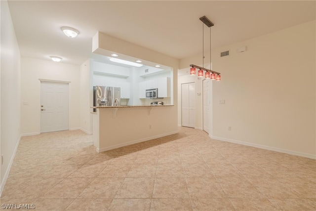 interior space with light tile floors