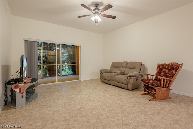 living room featuring ceiling fan and light tile floors